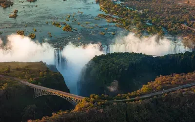 Aerial view of Victoria Falls and the bridge spanning the gorge