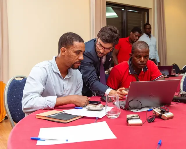 Participants use the NDC Implementation Plan Tool during a training session in São Tomé and Príncipe, 2025.